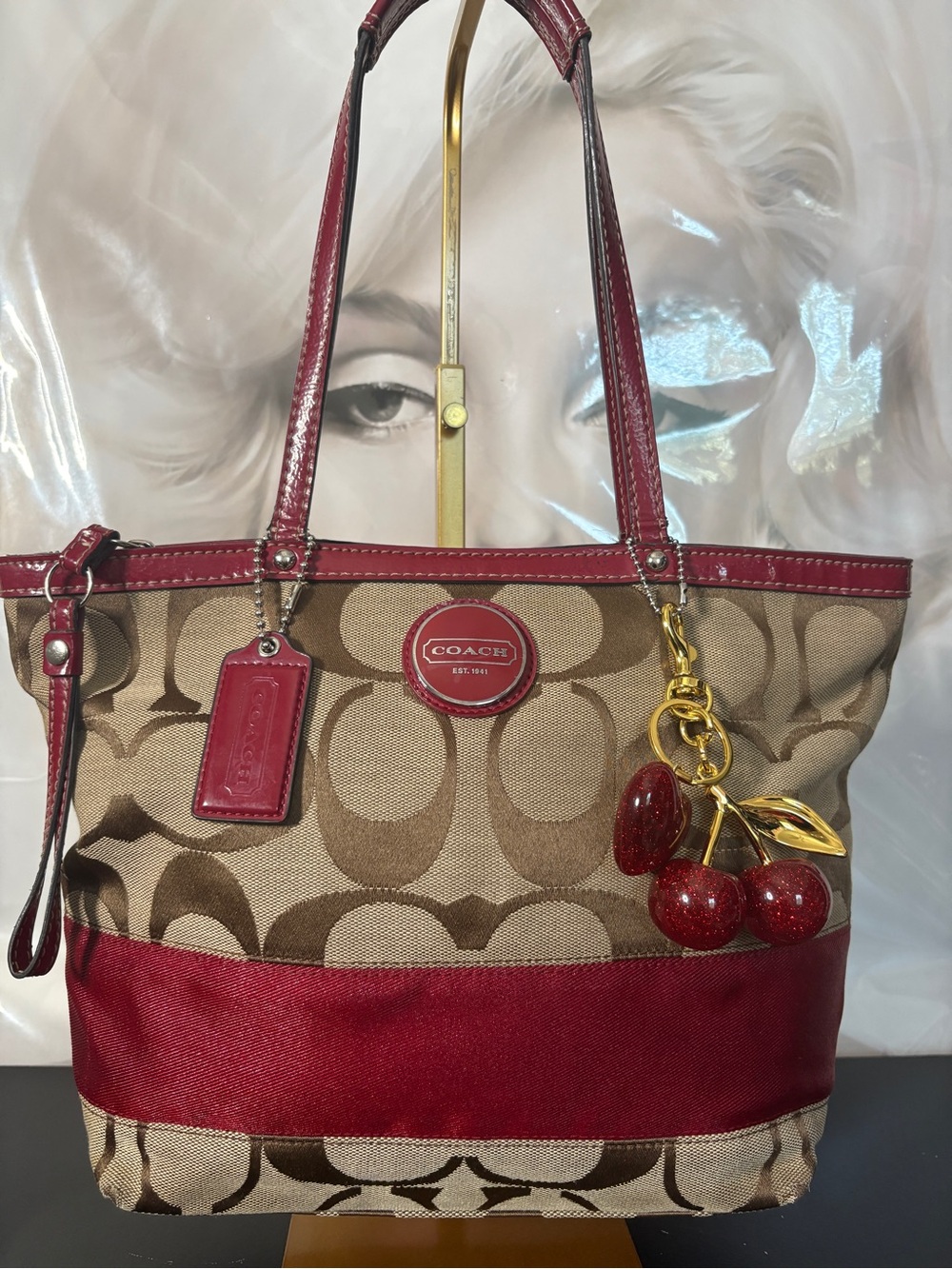Coach Beige Signature Canvas Tote with Red Trim and Cherry Charm